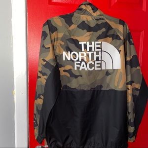 •The north face wind breaker